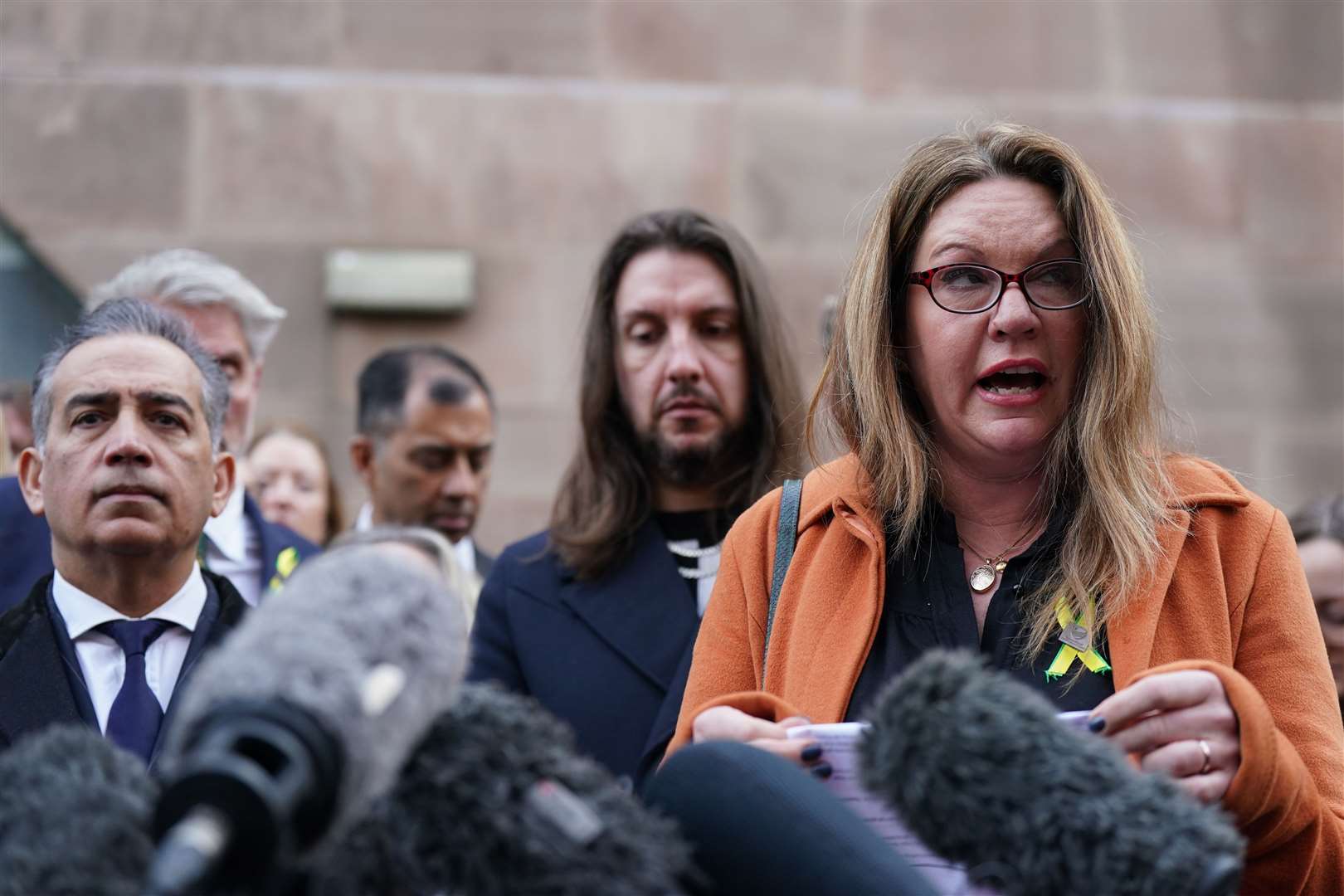Emma Webber, mother of Barnaby Webber, making a statement alongside relatives of the victims, outside Nottingham Crown Court (Jacob King/PA)