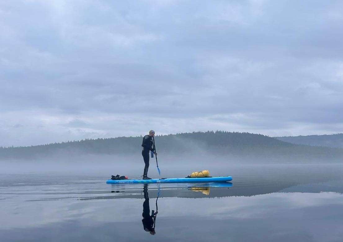 The first two hours of Derek Steele's paddleboarding challenge were done in misty conditions.