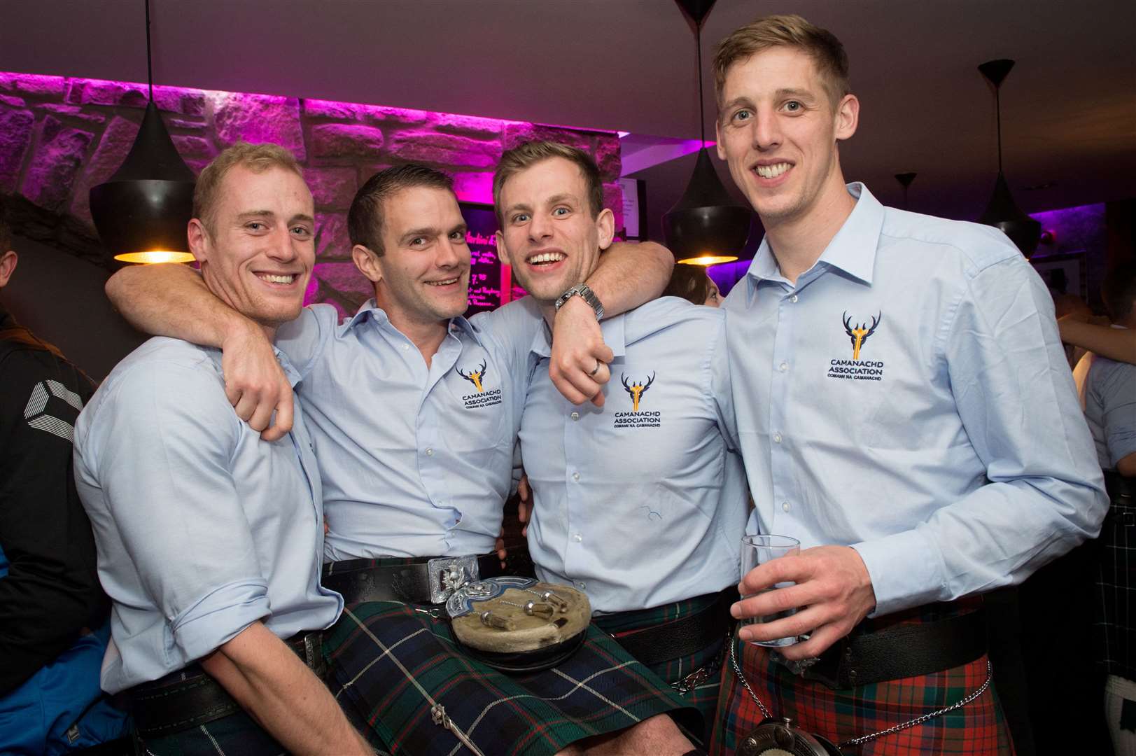 Celebrating the Scotland shinty win in The Den are (left to right) Connor Cormack, Keith Macrae, Zander Ferguson and Shaun Nicolson.