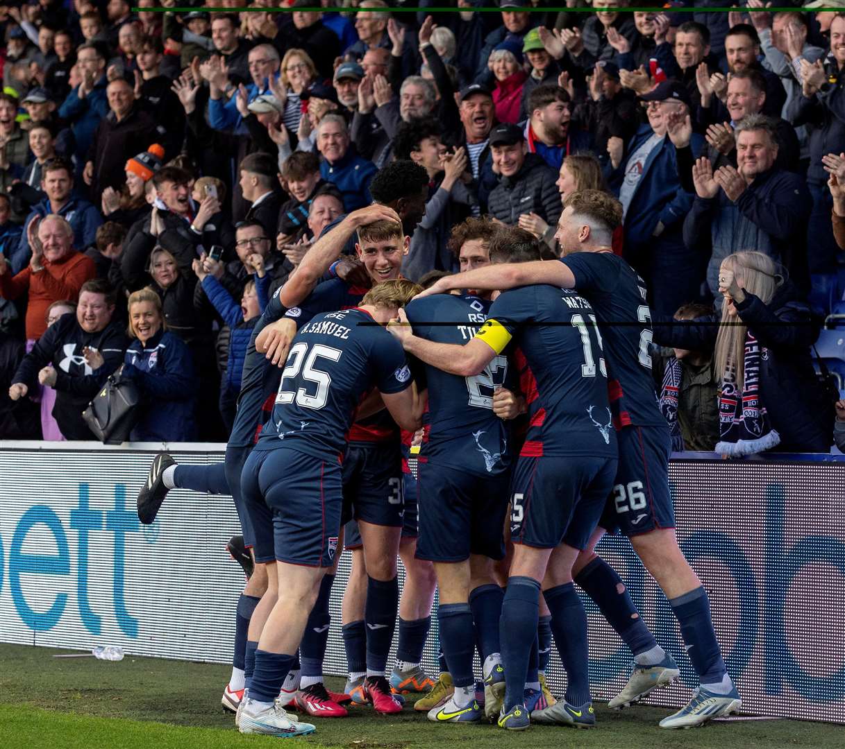 Jack Baldwin was mobbed by teammates after scoring in the 90th minute against St Johnstone. Picture: Ken Macpherson