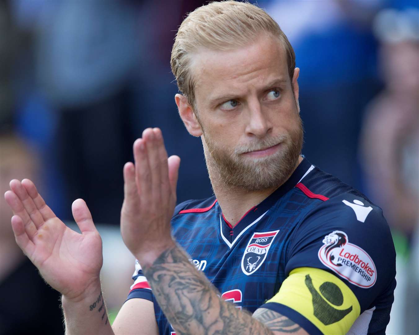 Ross County captain Andrew Davies applauds the Staggies supporters in 2018. Picture: Ken Macpherson
