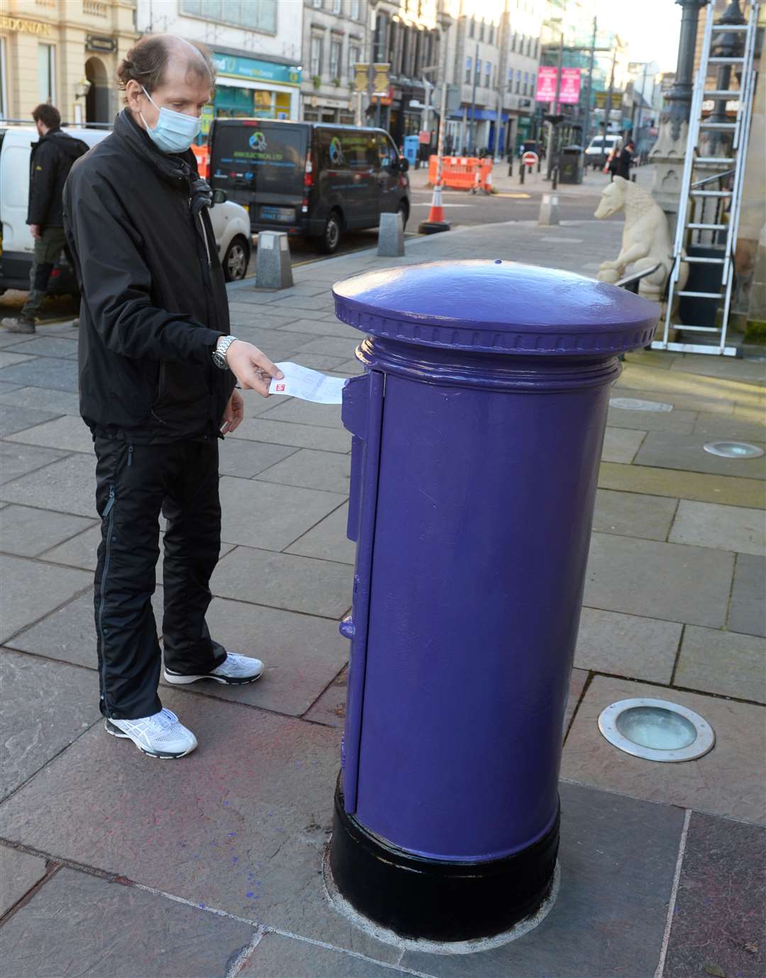 The purple post box outside Inverness Town House.