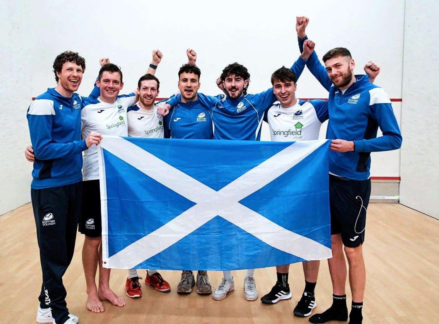 Scotland celebrate promotion at European Championships.