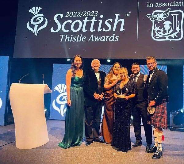 Staff of MacGregor's bar picking up their award. Picture: Music from Scotland