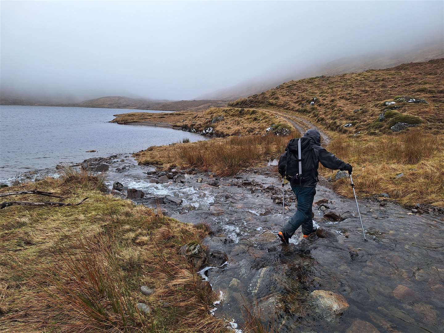 Crossing a burn on the old track along the north shore of Loch Calavie.