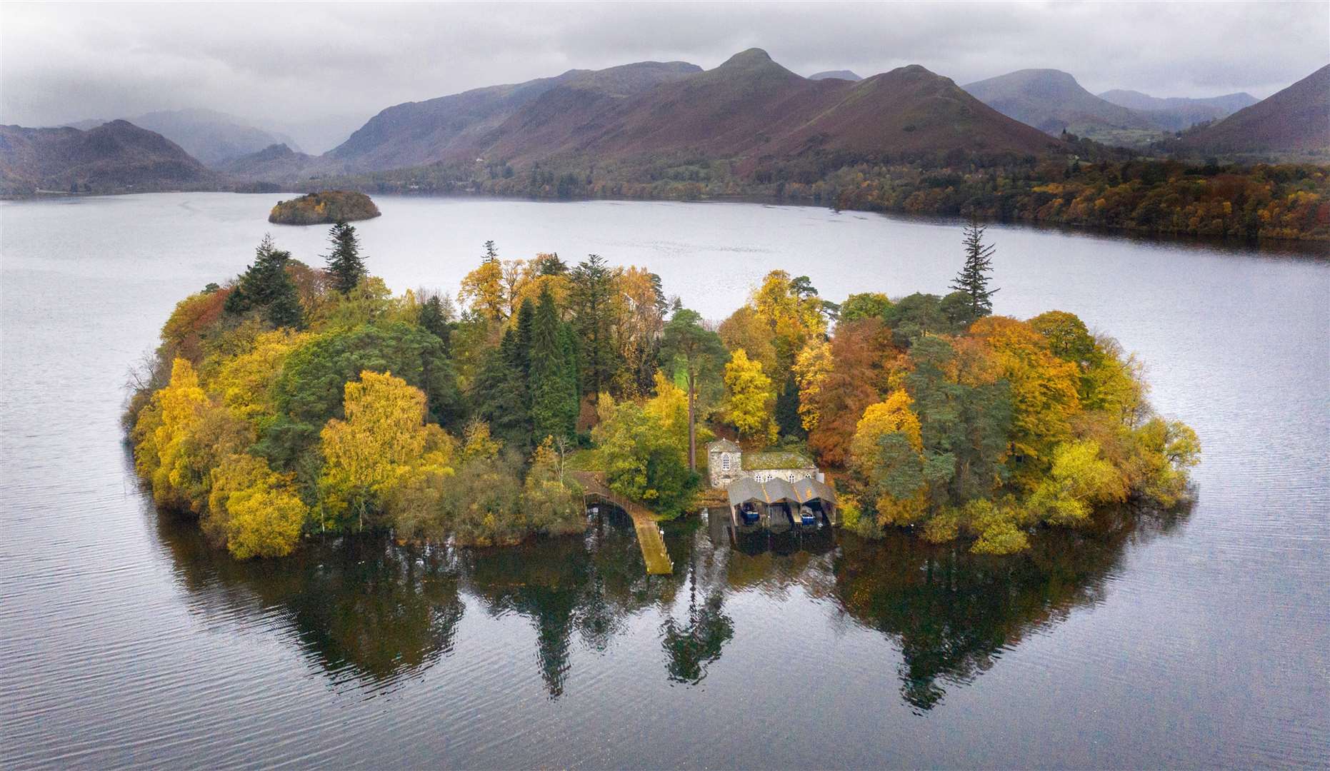 Aerial view of autumn colours on Derwent Isle on Derwentwater near Keswick in the Lake District (Owen Humphreys/PA)