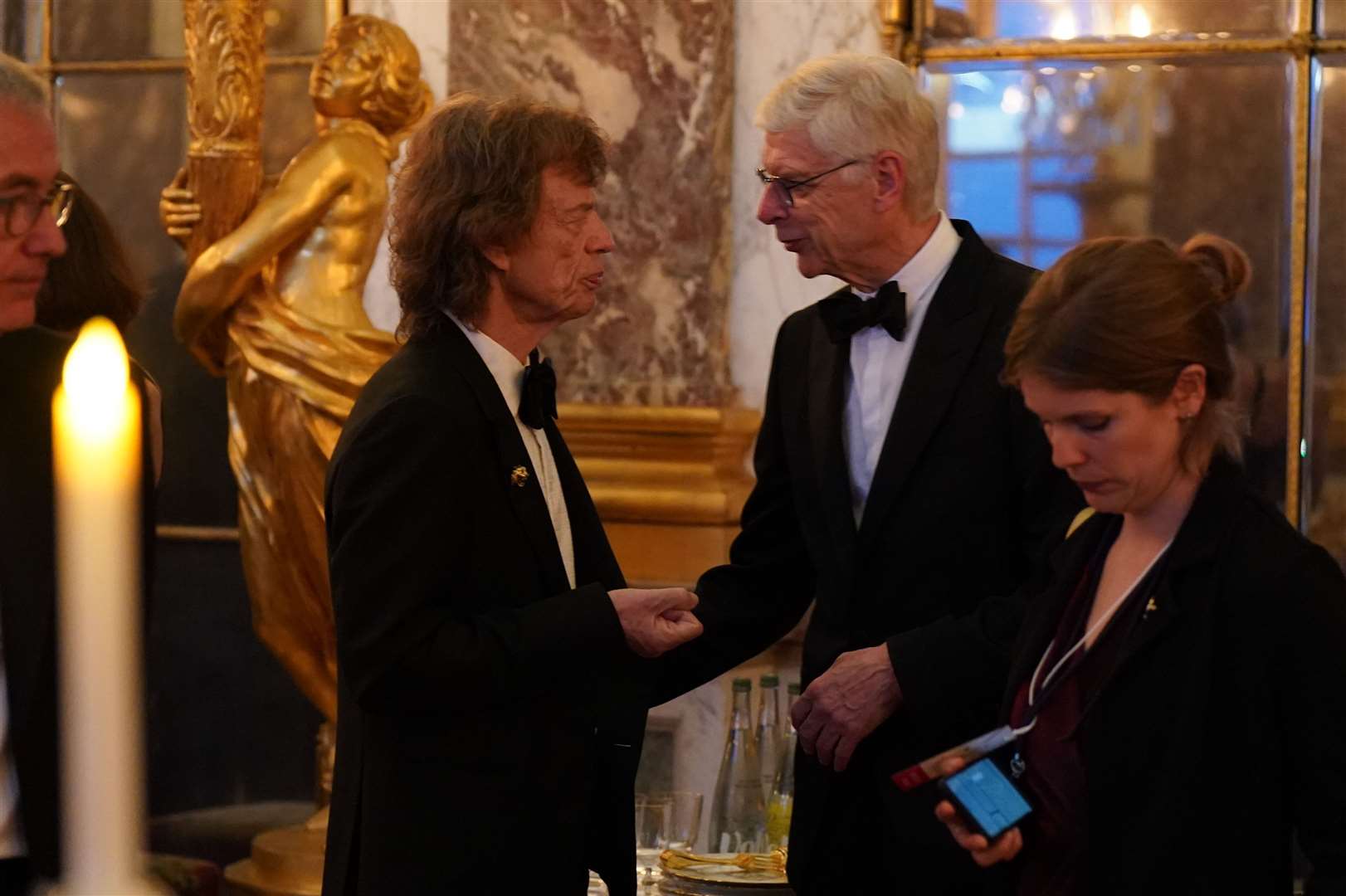 Sir Mick Jagger and Arsene Wenger attending the state banquet (Arthur Edwards/The Sun/PA)