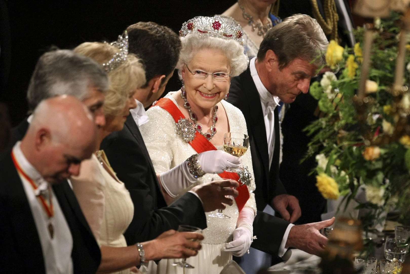 The Queen toasts French President Nicolas Sarkozy at a state banquet at Windsor Castle in 2008 (Matt Dunham/PA)