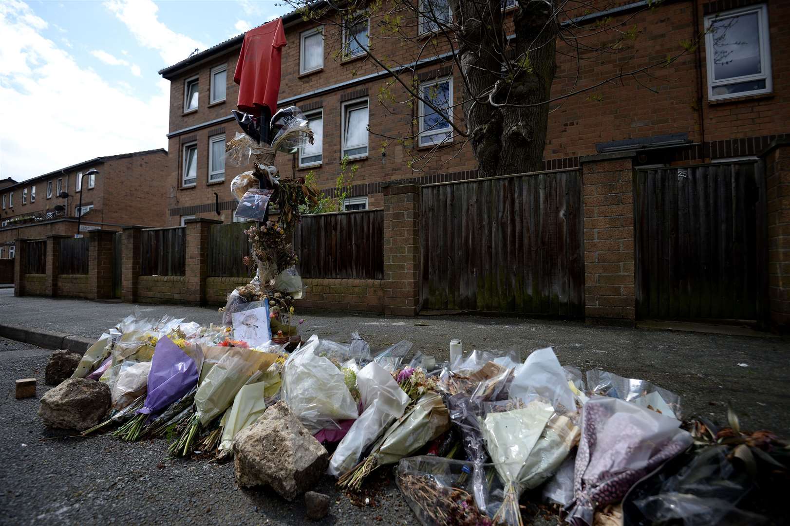 Tributes on Ferncliff Road in Hackney, where Abraham Badru was shot dead (Kirsty O’Connor/PA)