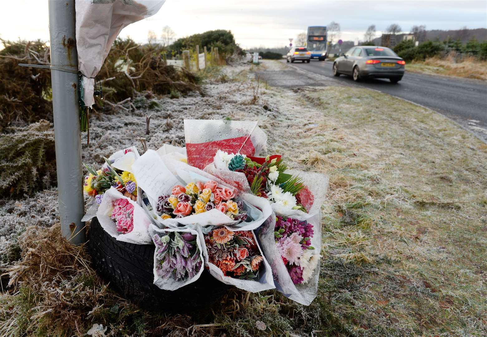 Floral tributes were left at the junction of the A9 and B9161 where popular teenager Gregor McIntosh died. Picture: Gary Anthony