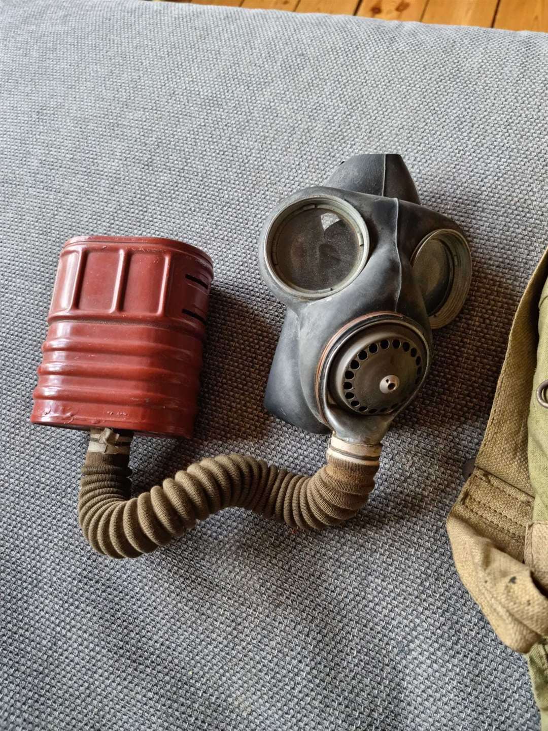 The Second World War gas mask and items found in the loft by Shayne MacDonald.