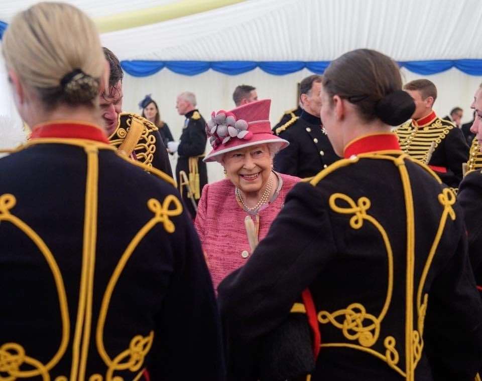 Fiona (right) meets the Queen