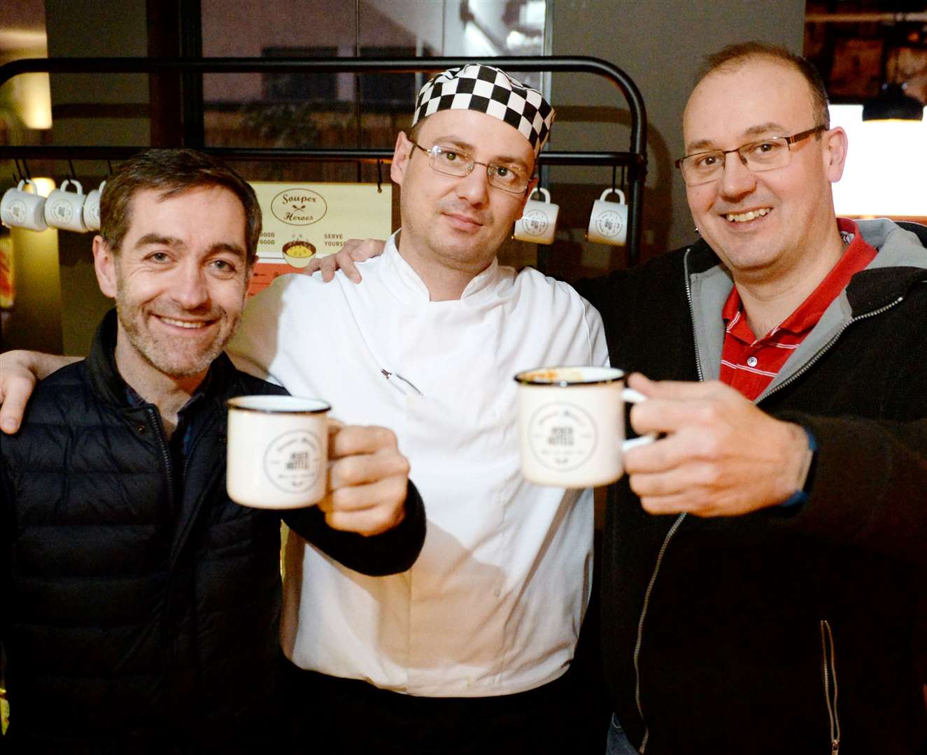 James Dunbar (left), chief executive of New Start Highland and hotel manager Zsolt Jakri with head chef Bartek Palarski.
