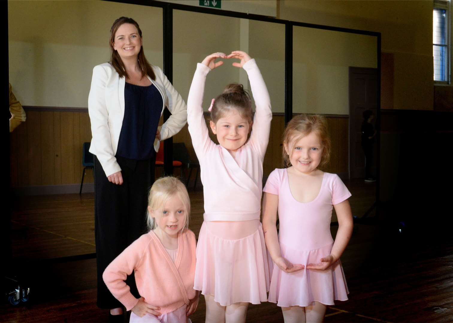 Kayleigh Redford, assistant principal of TFX Performing Arts Academy, with dancers. Picture: James Mackenzie