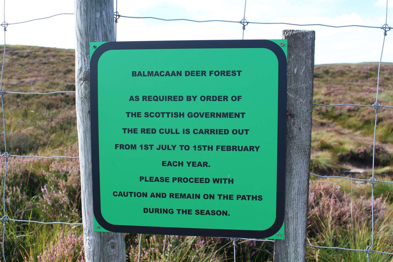 The sign beside the stile offers scant information about stalking activities in the area.