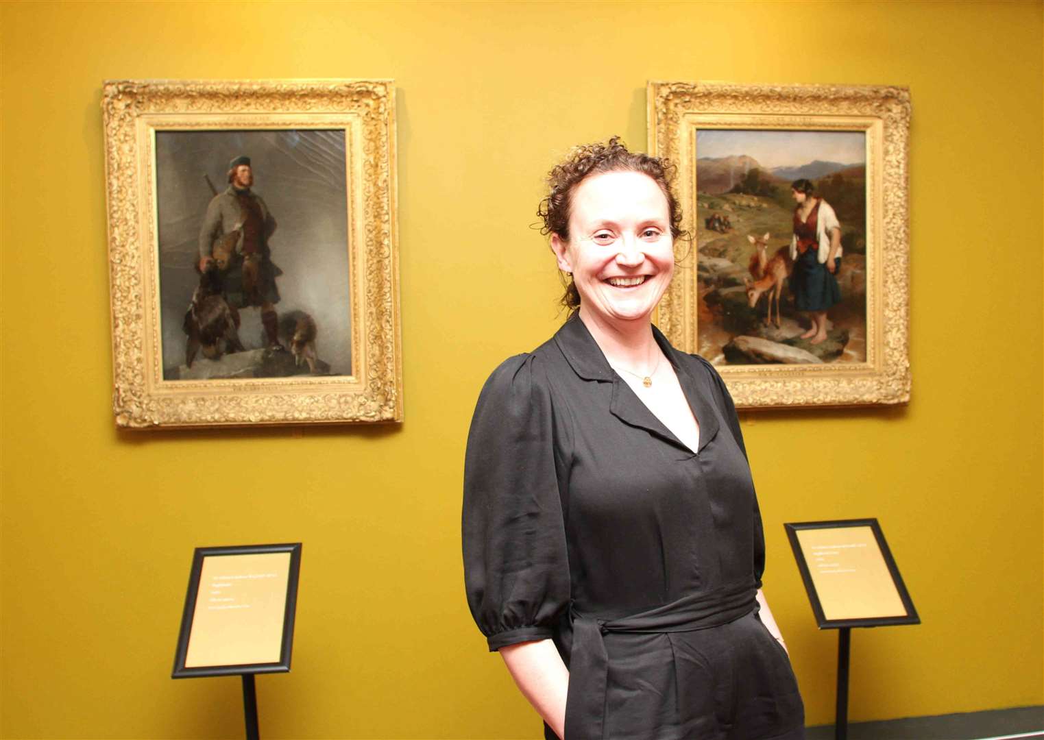 Curator Helen Avenell beside 'The highlander' (left) and 'The Hghland Lassie' (right)