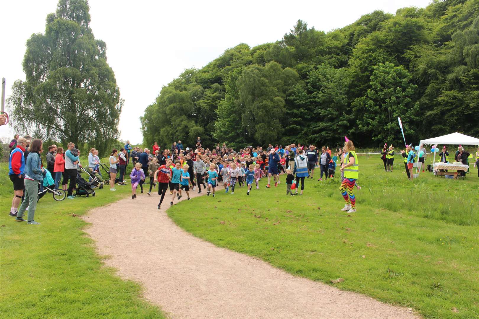 The junior parkrunners set off in Sunday's anniversary event. Pictures: John Davidson