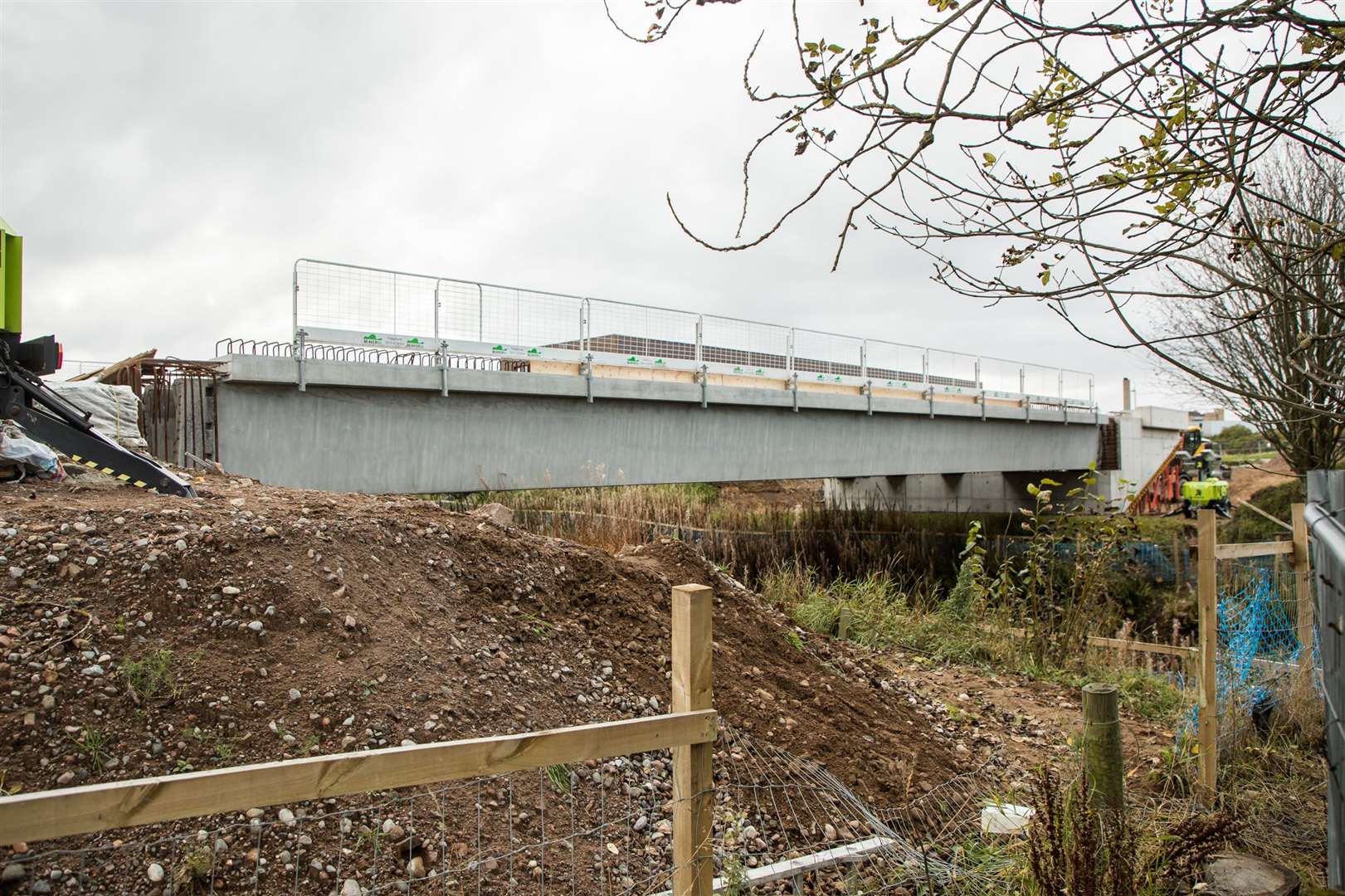 The new bridge crosses the main Inverness to Perth rail line.
