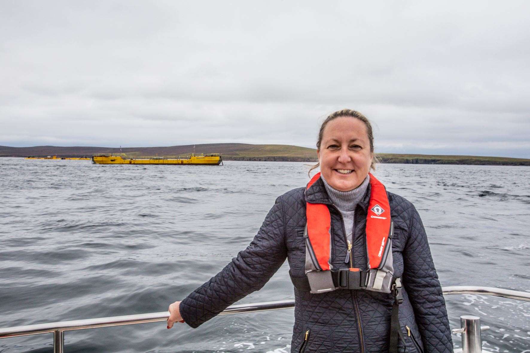 Anne-Marie Trevelyan MP, Uk energy minister, at EMEC tidal test site to see the Magallanes and Orbital tidal turbines in action.