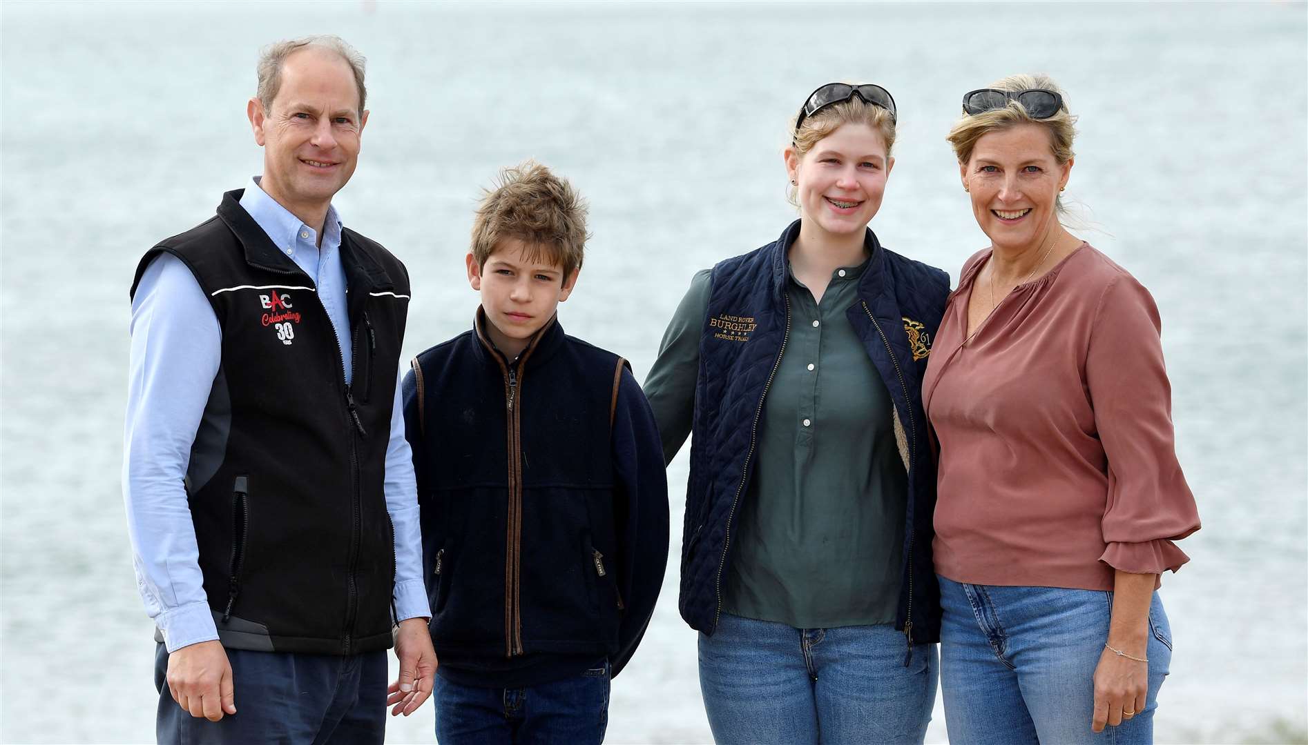 The Earl and Countess of Wessex pictured taking part in a beach litter pick with their children Lady Louise Windsor and James Viscount Severn (Toby Melville/PA)
