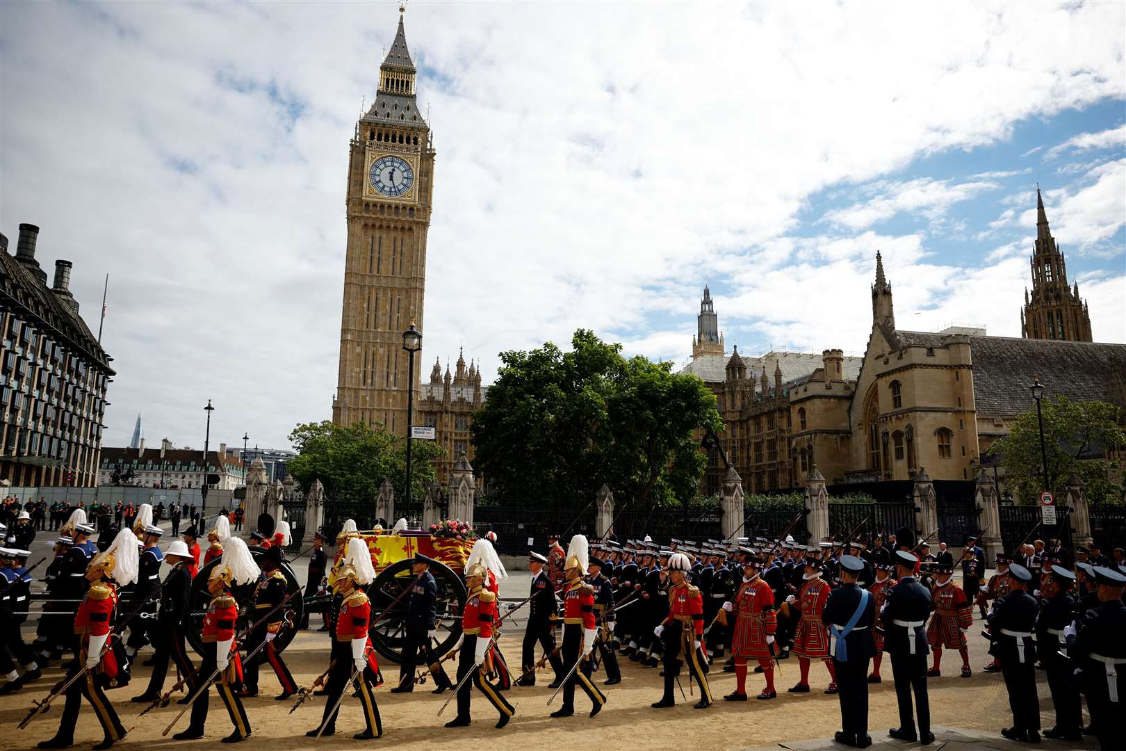 The Queen’s coffin as it leaves Westminster Abbey (Sarah Meyssonnier/PA)