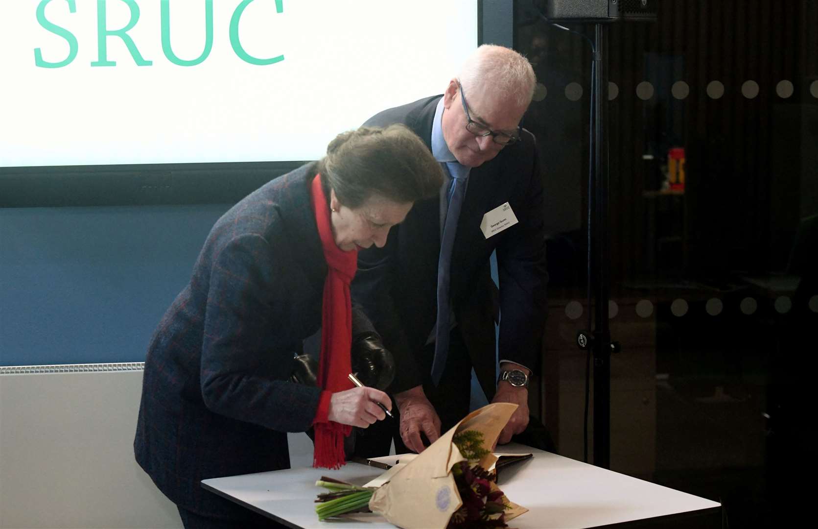 Princess Anne signs the guest book at the official opening of the Rural and Veterinary Innovation Centre. Picture: James Mackenzie.