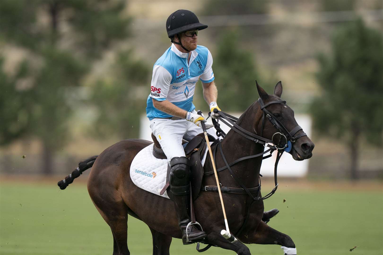 The Duke of Sussex plays in a polo match during the Sentebale ISPS Handa Polo Cup at the Aspen Valley Polo Club in Carbondale, Colorado (Kirsty O’Connor/PA)