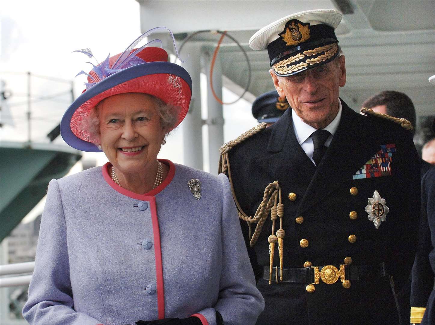 The duke, in his Naval uniform, with the Queen (PA)