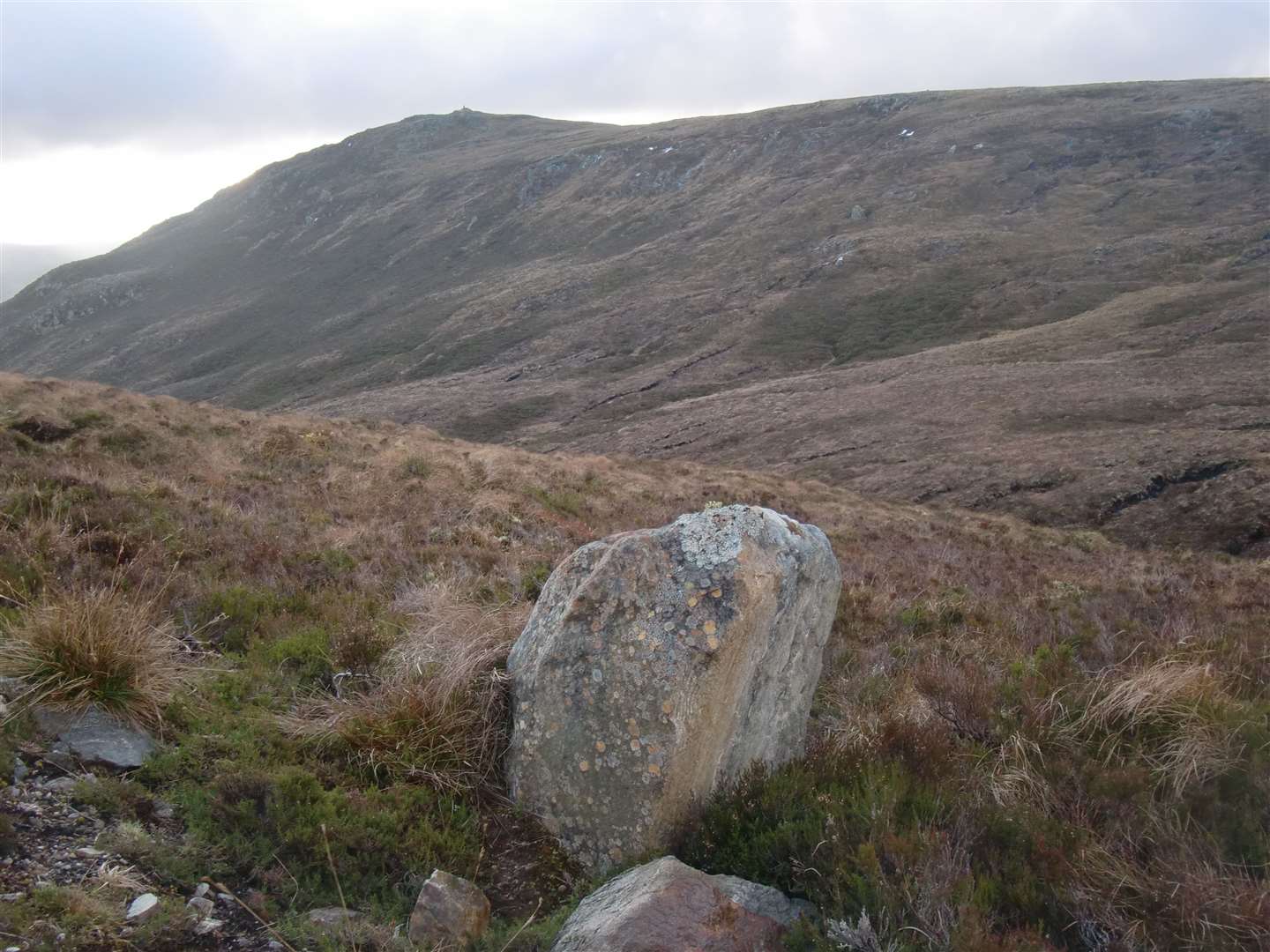 The trig point on Carn na Coinnich from the point where we left the track.