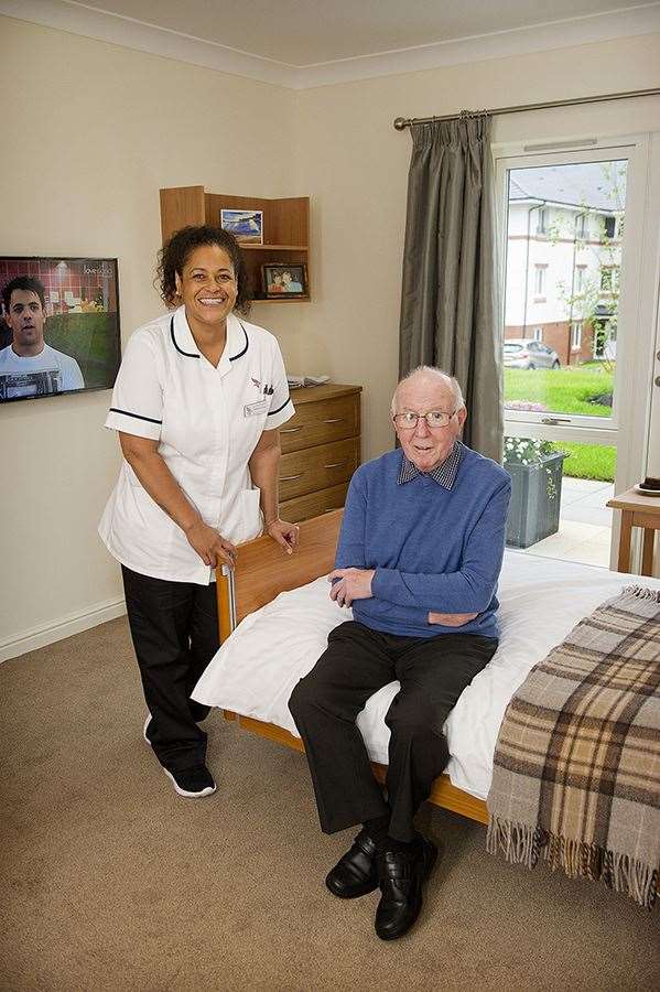Meallmore Newton Mearns first resident John Mullen, and nurse Genevieve Anang