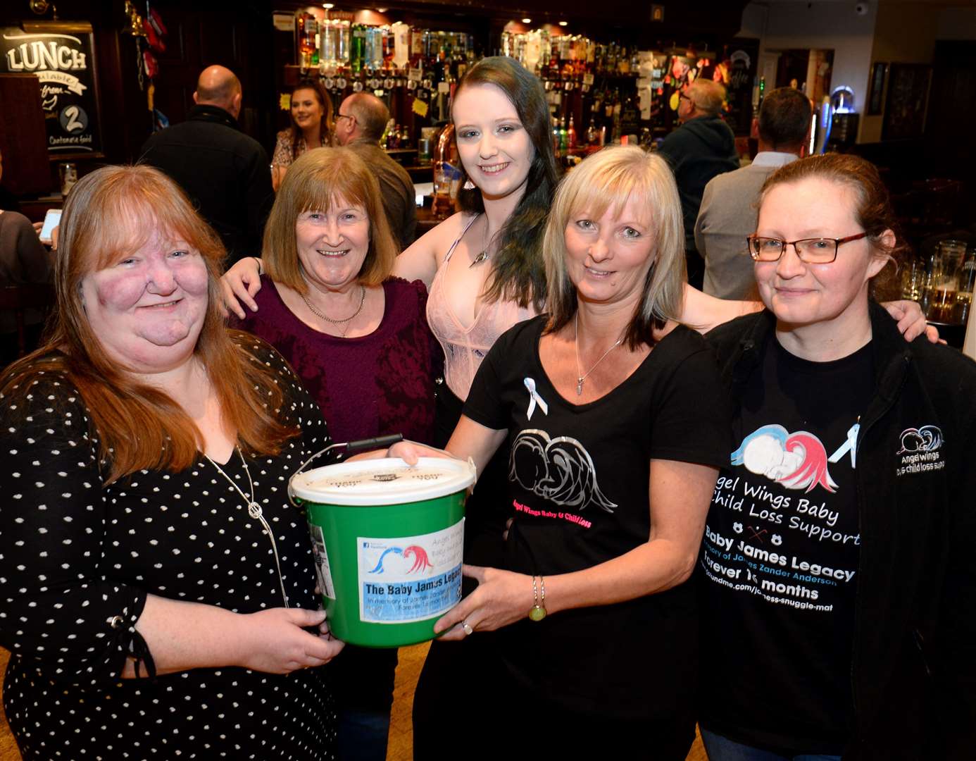 Angel Wings supporters collect donations at the Blacksmiths.