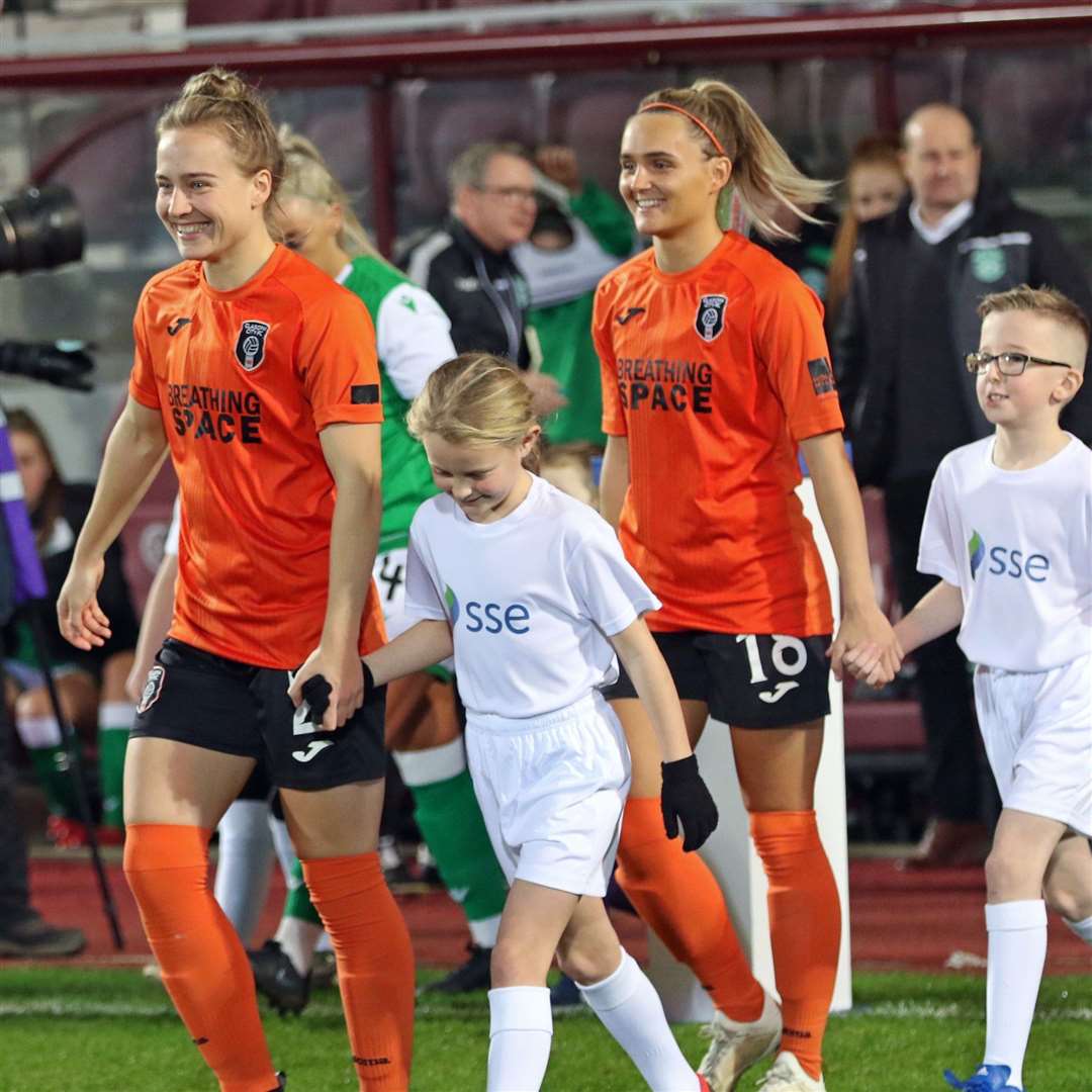 Rachel McLauchlan (left) is all smiles as she steps on to the pitch for the 2019 Scottish Cup final between Glasgow City and Hibernian at Tynecastle. Picture: Tommy Hughes