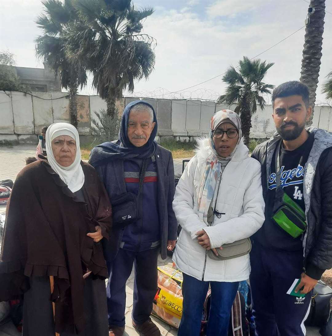 Dr Salim Ghayyda's mother Dalal (75), father, Nabil (85), his sister Hadeel and nephew, Waleed (23) cross the border from Gaza into Egypt.