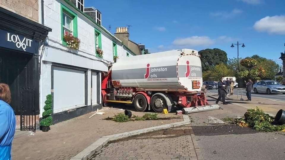 The oil delivery vehicle crashed into a shop and houses in Beauly. Picture: Emily Purvis.