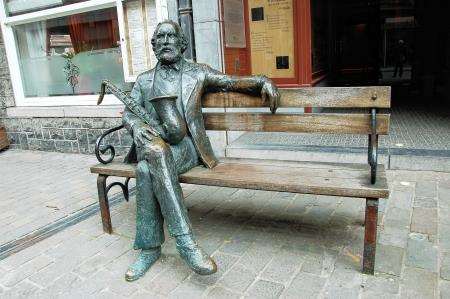 The statue of Adolph Sax outside the museum on the main street of Dinant