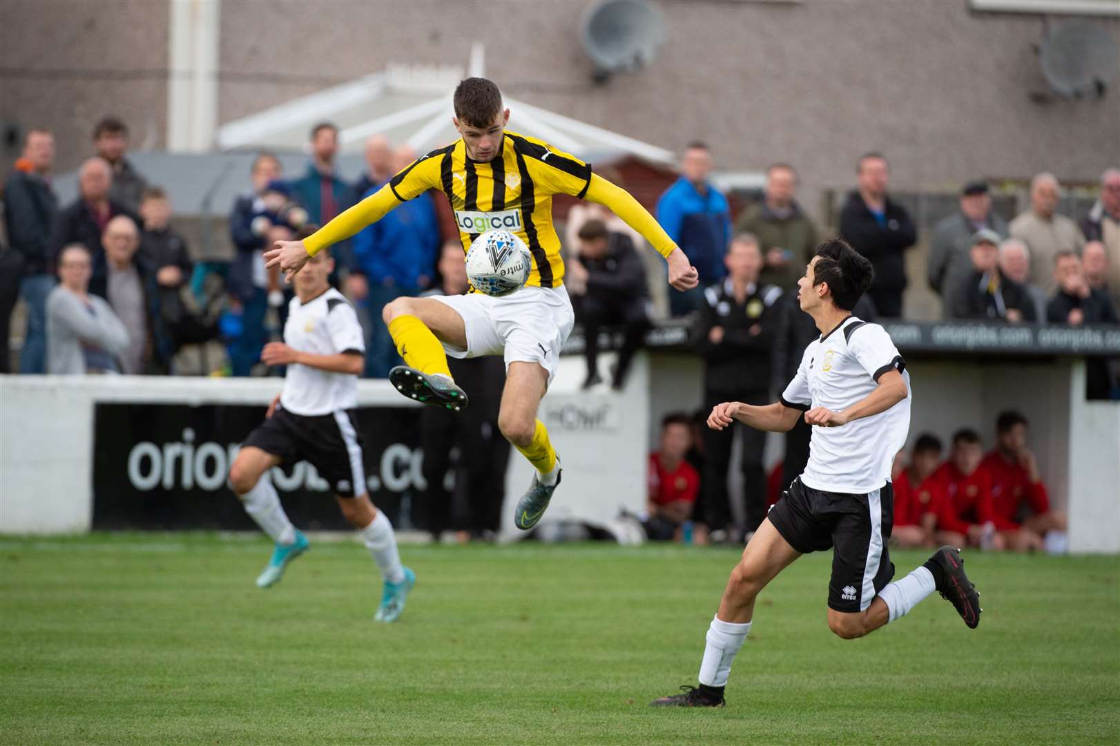 Nairn striker Dylan Mackenzie collects the ball in mid flight during last year's William Hill Scottish Cup fixture between Clachnacuddin and Nairn County.