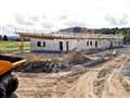 New golf course clubhouse takes shape as part of Inverness West Link