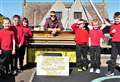WATCH: Sun shines in Highland village as Piano James resumes his 1400-mile trek