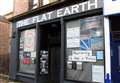 Flat Earth group posts a number of coronavirus theories in its Inverness window