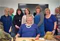 Helen Gardiner from Dickinson's Real Deal visits hospice's retail managers