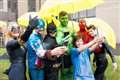 Superheroes bring festival into hospital