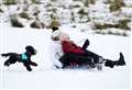 PICTURES: Snowy fun as families hit the slopes