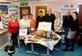 Prize raffle raises funds for sight charity work