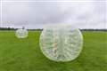 Nine-year-old boy seriously injured as inflatable zorb ball ‘blown off lake’