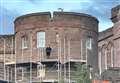 Person pictured on scaffolding at Inverness Castle