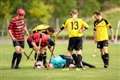 Referee injury halts league decider