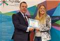 Young tennis coach awarded for contribution to the sport