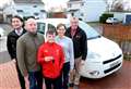 Family given free car by taxi firm