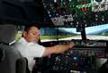 Krys helps Highlanders grounded by Covid to enjoy some flying thrills with his full size Boeing simulator
