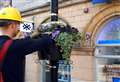 Hanging baskets given a lift by electricity network staff